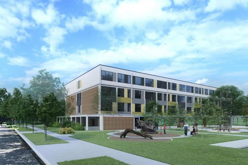 Architectural rendering of The Regenerator, a multi-story modern building in West Englewood with a mixed brick, gold, and gray facade, surrounded by landscaped lawns, walking paths, and a sculptural tree feature in the foreground.