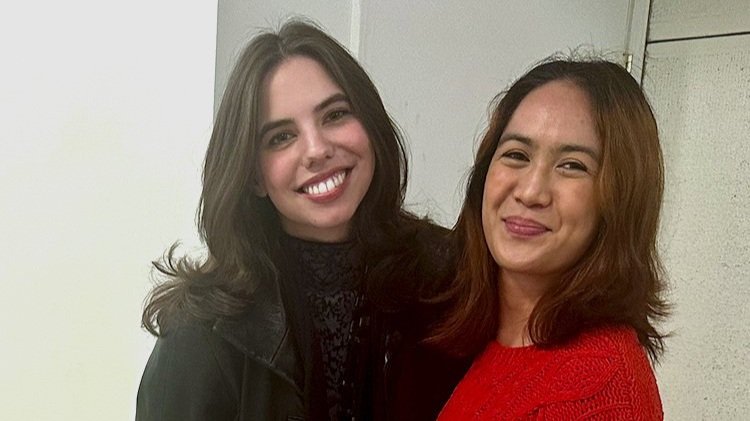 Field Fellow Reese Castro (right) with consultant Grayson Ticer at Field's holiday party in December 2024.